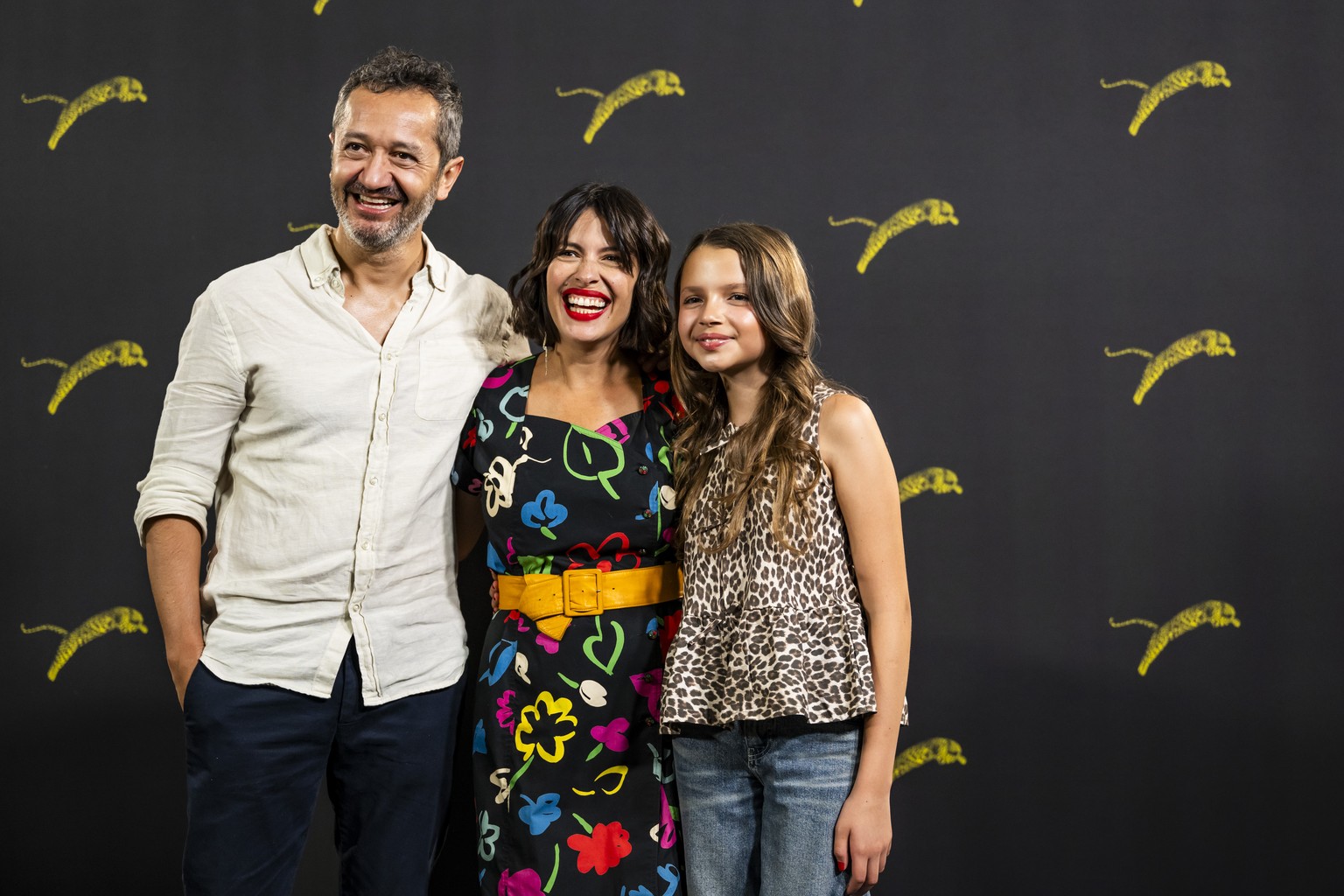 Gonzalo Molina, left, actor from Peru, Klaudia Reynicke, center, Swiss-Peruvian filmmaker and actress Abril Gjurinovic, right, pose during a photocall for the movie &quot;Reinas&quot; at the 77th Loca ...