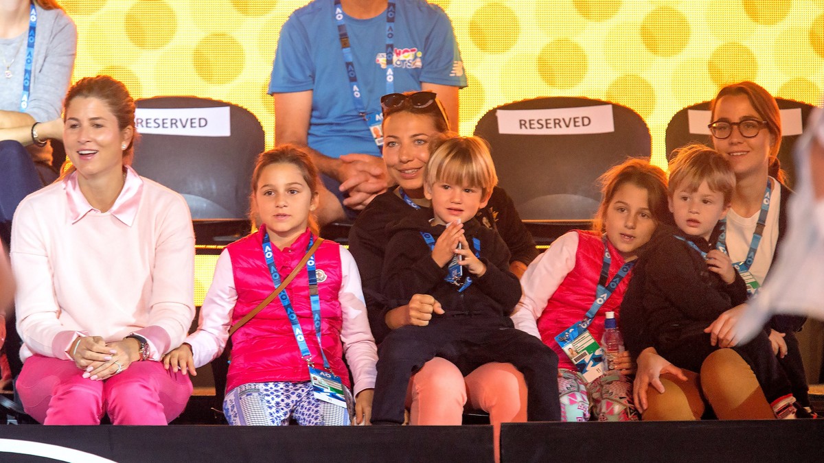epa06434844 A handout photo made available by Tennis Australia shows Roger Federer (not pictured) of Switzerland's family; Mirka Federer (L) and two sets of twin children, Myla Rose Federer, Char ...