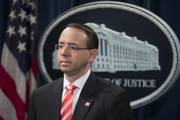 epa06623908 Deputy Attorney General Rod Rosenstein attends a news conference announcing cyber law enforcement action, at the Justice Department in Washington, DC, USA, 23 March 2018. In coordination w ...