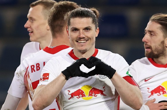 epa09084564 Marcel Sabitzer of Leipzig celebrates scoring the opening goal during the German Bundesliga soccer match between DSC Arminia Bielefeld and RB Leipzig at Schueco Arena in Bielefeld, Germany ...