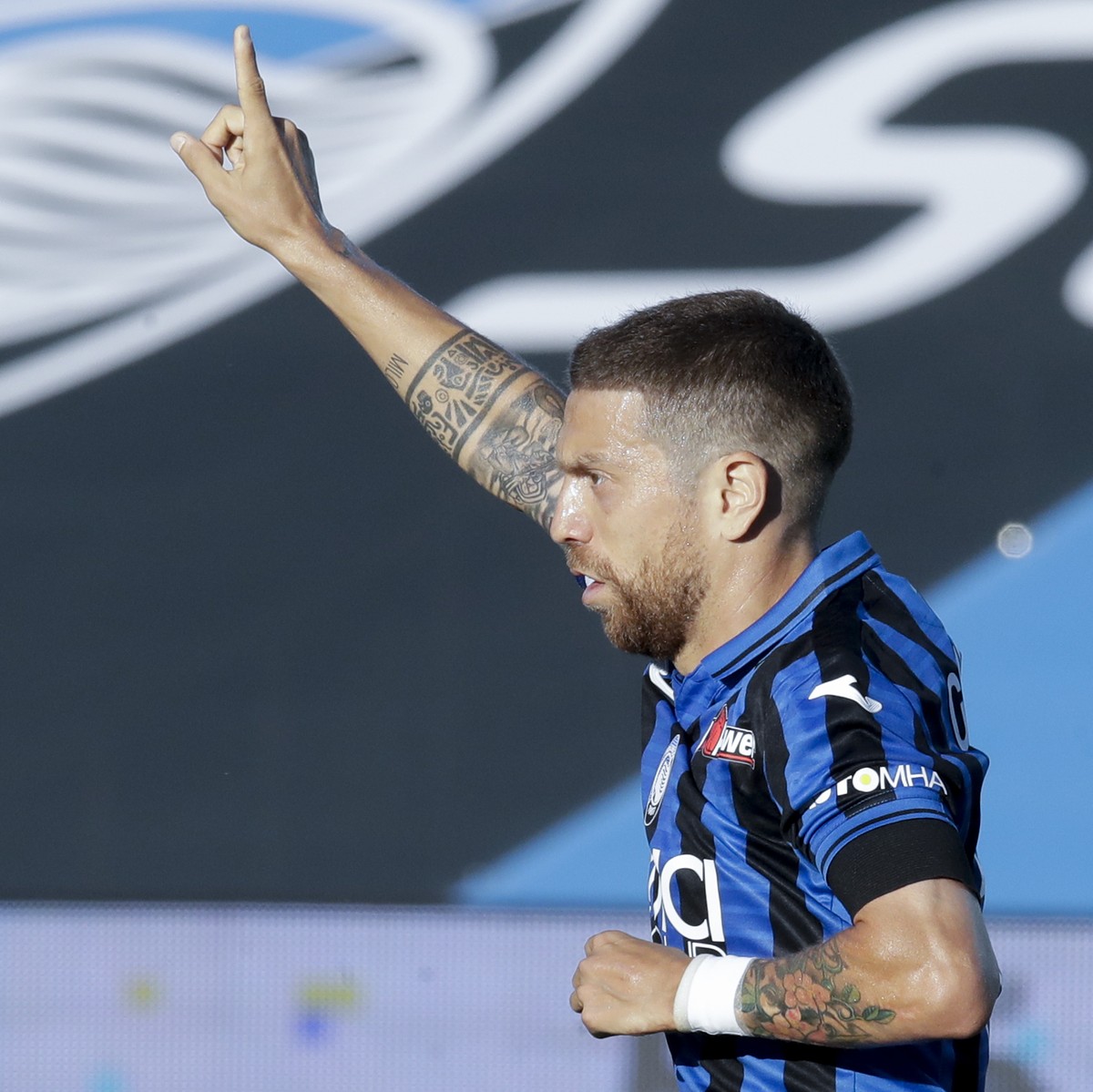 Atalanta's Papu Gomez celebrates a goal that was later disallowed, during the Serie A soccer match between Atalanta and Sassuolo at the Gewiss Stadium in Bergamo, Italy, Sunday, June 21, 2020. At ...