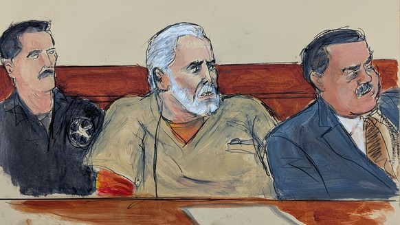 In this courtroom sketch, Ismael "El Mayo" Zambada, center, is seated in court during his sentencing, flanked by a U.S. Marshal, left, and his attorney Frank Perez, right, in federal court i ...