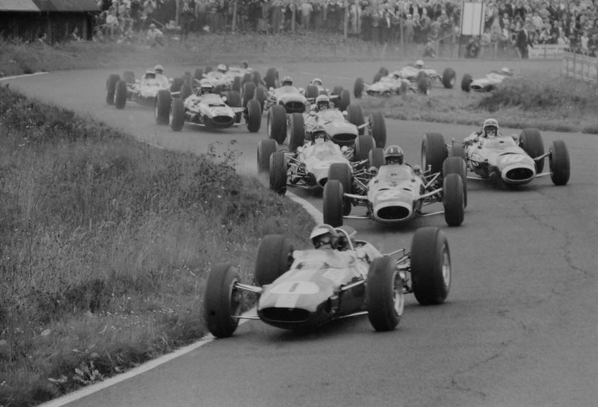 Scottish racing driver Jim Clark puts his Lotus (1) in the lead soon after the start of the German Grand Prix at Nurburgring, Germany, on Aug. 1, 1965. He went on to win the race and clinch the 1965 W ...