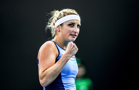 epa05723384 Timea Bacsinszky of Switzerland reacts during her women&#039;s Singles first round match against Camila Giorgi of Italy at the Australian Open Grand Slam tennis tournament in Melbourne, Au ...