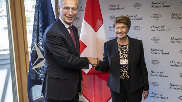 epa09971485 Jens Stoltenberg (L), Secretary-General, North Atlantic Treaty Organization, meets with Swiss Federal Councillor and defense minister Viola Amherd, for bilateral talks in the House of Swit ...