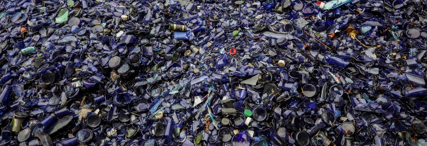 epa07786020 Close-up view of glass bottles in the recycling company MultiRecicla&#039;s sorting plant in the town of Mampote, Venezuela, 15 August 2019 (Issued on 22 August 2019). The &#039;Protect Pa ...