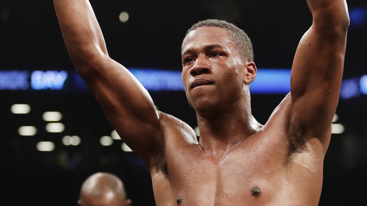 Patrick Day celebrates after defeating Kyrone Davis in a WBC super welterweight championship boxing match on Saturday, March 3, 2018, in New York. (AP Photo/Frank Franklin II)