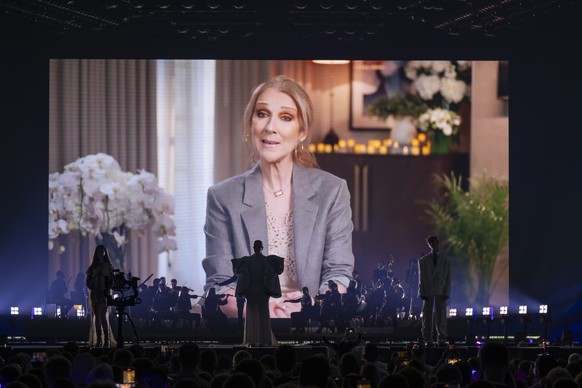 KEYPIX - A video message from Celine Dion during the dress rehearsel and preview show of the first semi-final at the 69th Eurovision Song Contest in Basel, Switzerland, on Monday, May 12, 2025. (KEYST ...