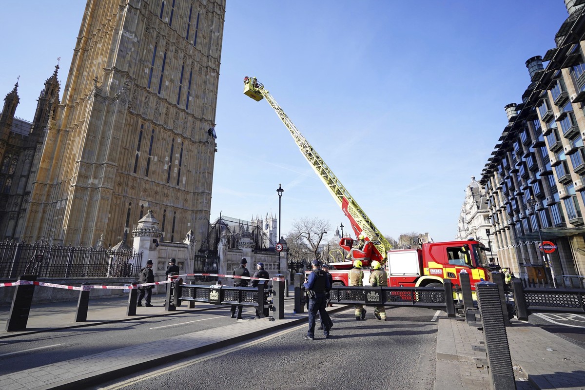 Emergency services at the Palace of Westminster in London after man with a Palestine flag climbed up Elizabeth Tower, which houses Big Ben,Saturday, March 8, 2025. (James Manning/PA via AP)
Britain Bi ...