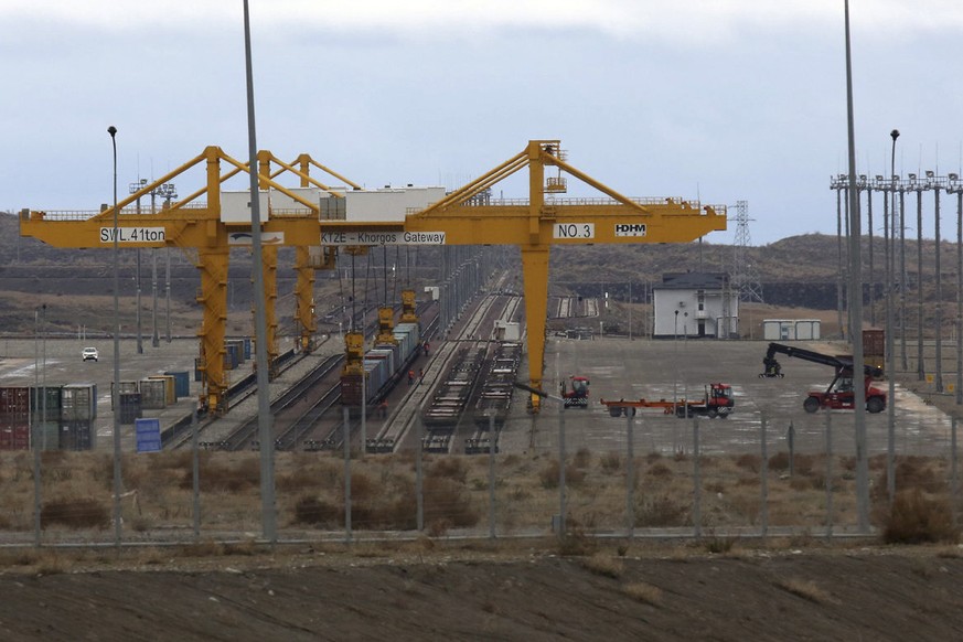 In this April 1, 2018, photo, vehicles work at the Khorgos Gateway, one of the world&#039;s largest dry dock in a remote crossing along Kazakhstan&#039;s border with China near Khorgos. Khorogs Gatewa ...