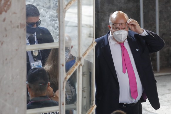 Germany&#039;s Federal Minister for Economic Affairs and Energy Peter Altmaier arrives at Palazzo Reale in Naples, Italy, Friday, July 23, 2021, to take part in a G20 meeting on environment, climate a ...