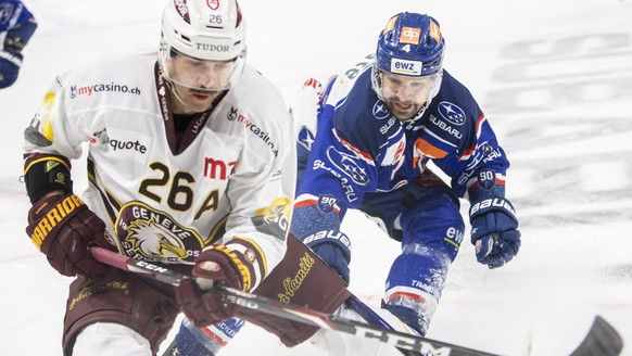 Servettes Daniel Winnik, links, kaempft um den Puck gegen Zuerichs Patrick Geering, rechts, im ersten Eishockey Playoff-Halbfinalspiel der National League zwischen den ZSC Lions und dem Geneve-Servett ...