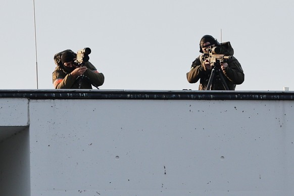 Special forces are positioned on the roof of the chancellory in Berlin, Germany, Sunday, Dec. 14, 2025. (AP Photo/Maryam Majd)
Germany Russia Ukraine War
