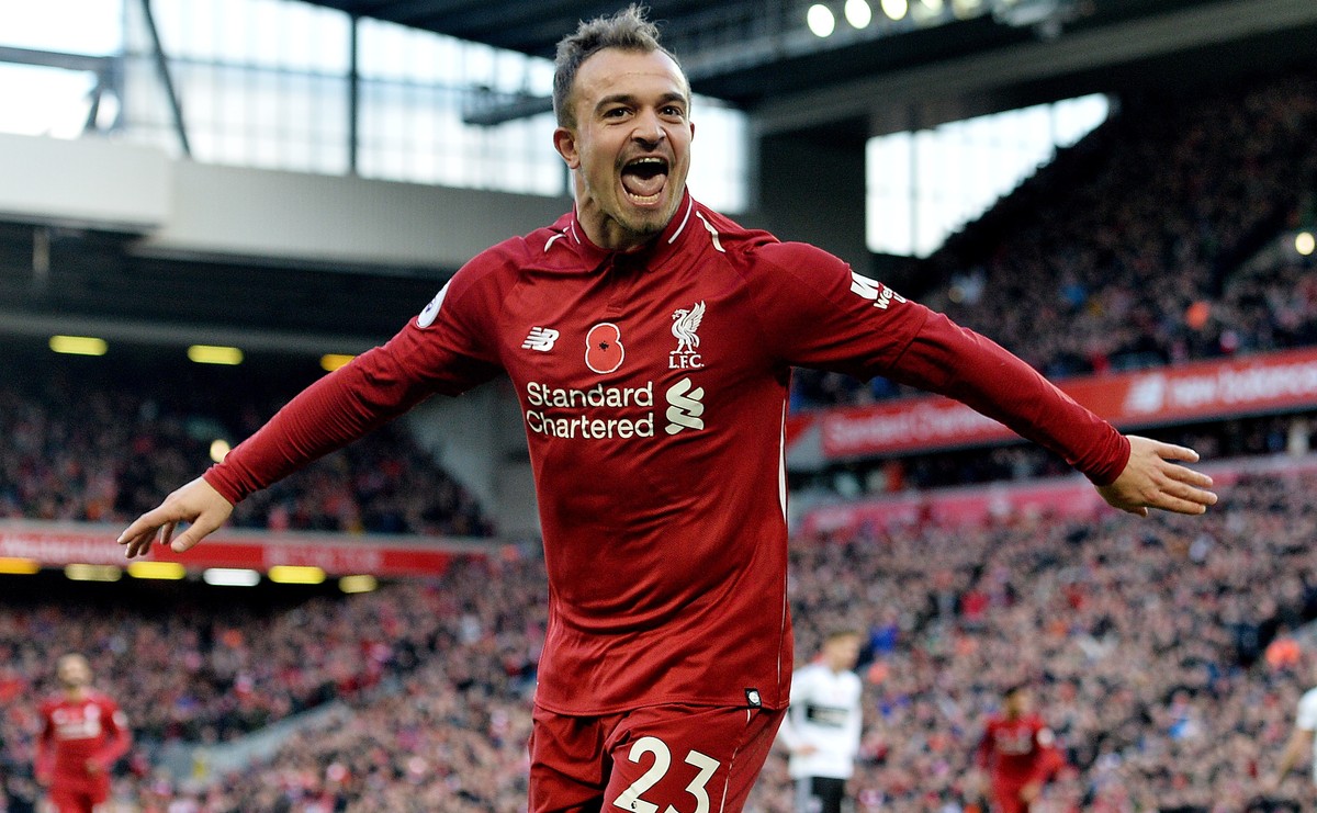 epa07158234 Liverpool's Xherdan Shaqiri celebrates scoring the second goal making the score 2-0 during the English Premier League soccer match between Liverpool and Fulham at the Anfield in Liver ...