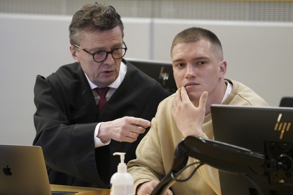 Former member of Russian private military contractor Wagner Group Andrey Medvedev, right, listens to his lawyer Brynjulf ​​​​​​Risnes during a court hearing in Oslo, Tuesday, April 25, 2023. Medvedev, w...