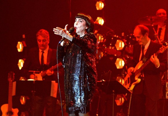 Mireille Mathieu in Warsaw Mireille Mathieu performs in Torwar on March 05, 2020 in Warsaw, Poland EN014183500014 PUBLICATIONxNOTxINxPOL