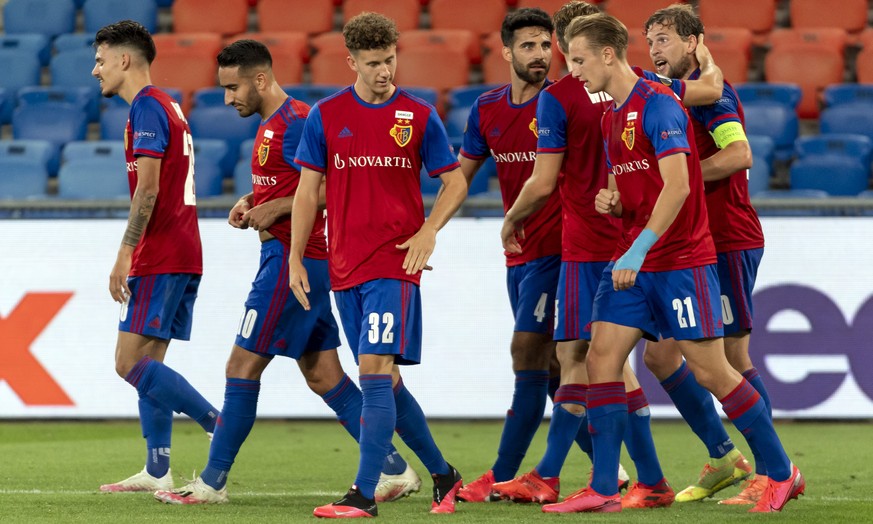 Basel&#039;s players cheer after scoring during the UEFA Europa League round of sixteen second leg soccer match between Switzerland&#039;s FC Basel 1893 and Germany&#039;s Eintracht Frankfurt at the S ...