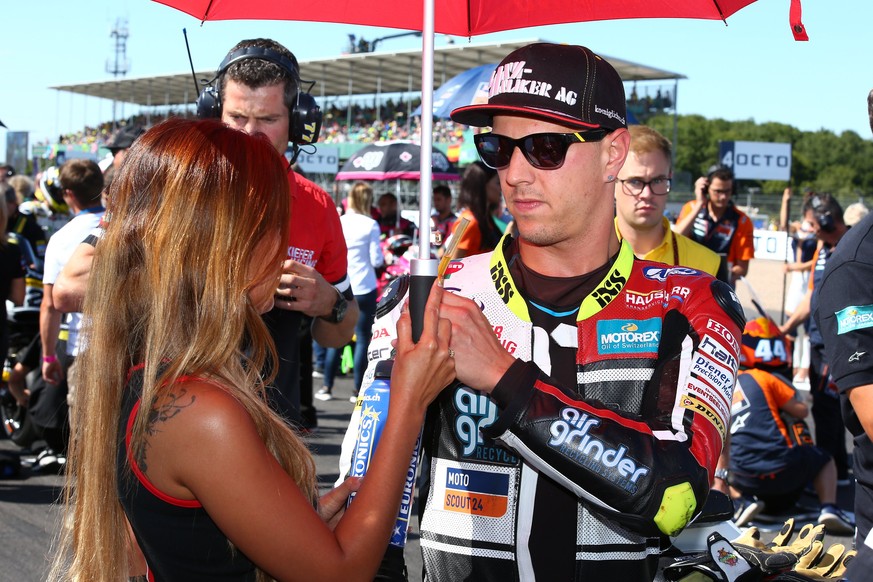 epa06167093 Swiss Moto2 rider Dominique Aegerter of the Keifer Racing Suter team on the grid during the Moto2 race of the 2017 British Motorcycling Grand Prix at the Silverstone race track, Northampto ...