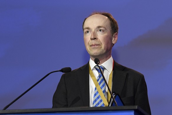 Finnish politician and member of the European Parliament Jussi Halla-aho, center, delivers a speech after he was elected to be the new chairman for the Finns Party at the party&#039;s congress in Jyva ...