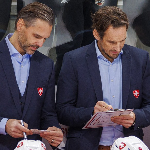 Team Switzerland assistant coach Thierry Paterlini, head coach Patrick Fischer and assistant coach Patrick Schoeb during the ice hockey game during the SWISS Ice Hockey Games between Team Switzerland  ...