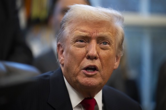 epa12517025 US President Donald Trump speaks to members of the media during a swearing in ceremony for Sergio Gor, the new US Ambassador to India, in the Oval Office at the White House in Washington,  ...