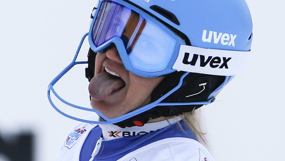 Joana Haehlen of Switzerland reacts in the finish area during the women&#039;s Slalom of the Alpine combination race at the FIS Alpine Ski World Cup, in St. Moritz, Switzerland, Friday, December 8, 20 ...