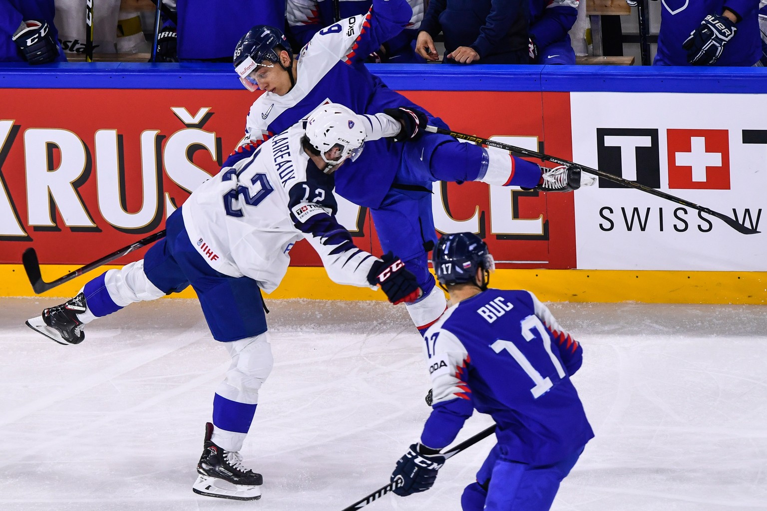 epa06725695 Valentin Claireaux (L) of France in action against Lukas Cingel (R) of Slovakia during the IIHF World Championship group A ice hockey match between Slovakia and France at the Royal Arena i ...