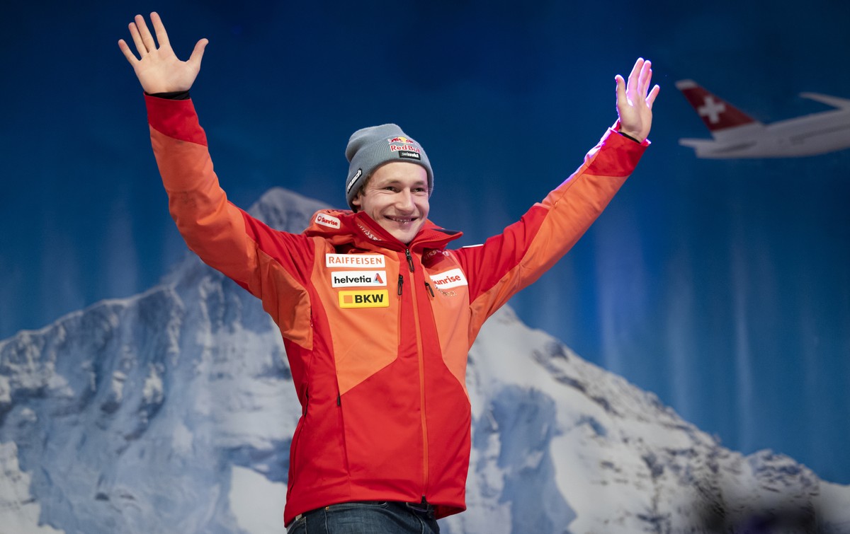 Second placed Marco Odermatt of Switzerland celebrates at the award ceremony of the men's downhill race at the Alpine Skiing FIS Ski World Cup in Wengen, Switzerland, Saturday, January 14, 2023.  ...