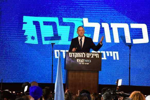 epa08265804 Benny Gantz, former Israeli army chief of staff and the Blue and White Israeli centrist political party candidate for prime minister speaks to supporters during the final elections event i ...