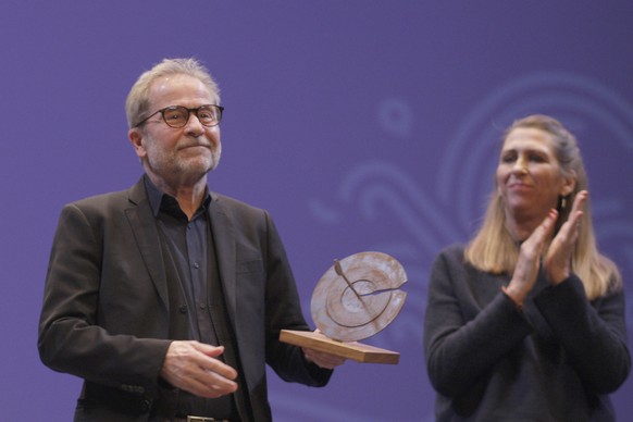 epa10315216 Austrian film director Ulrich Seidl (L) receives the Best Film Award for his film &#039;Rimini&#039; at Gijon&#039;s International Film Festival, in Gijon, northern Spain, 19 November 2022 ...