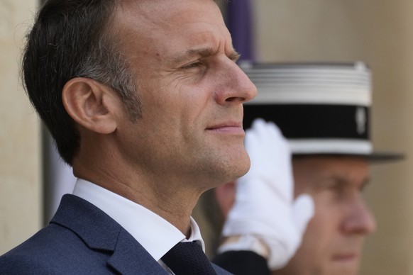 French President Emmanuel Macron waits for Hungarian Prime Minister Viktor Orban Wednesday, June 26, 2024 at the Elyseee Palace in Paris. Macron called snap elections following the defeat of his centr ...