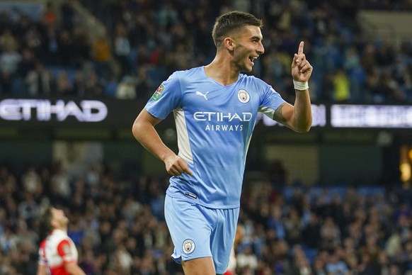 Manchester City's Ferran Torres celebrates after scoring his team's fourth goal during the English League Cup third round soccer match between Manchester City and Wycombe Wanderers at Etihad Stadium, in Manchester England, Tuesday, Sept. 21, 2021. (AP Photo/Dave Thompson)