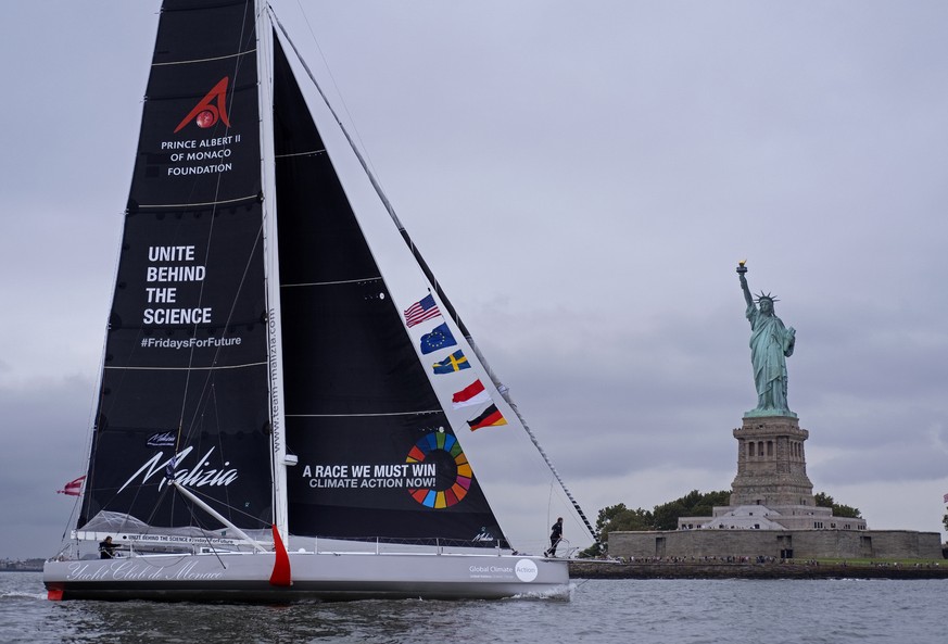 Greta Thunberg, a 16-year-old Swedish climate activist, sails into New York harbor aboard the Malizia II, Wednesday, Aug. 28, 2019. The zero-emissions yacht left Plymouth, England on Aug. 14. She is s ...