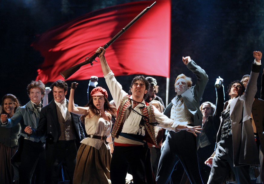 epa04330875 Actors perform on stage during the press rehearsal of the musical &#039;Los Miserables&#039; held at the Gran Teatre del Liceo in Barcelona, Spain, 25 July 2014. The musical runs from 25 J ...