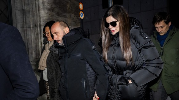 The owners of the bar in Crans-Montana, where the deadly fire happened on New Year's Day, Jacques and Jessica Moretti from France, center, arrive with their lawyers Yael Hayat and Patrick Michod, ...