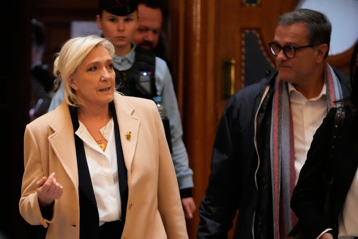 Far-right leader Marine Le Pen walks outside the courtroom during a short break in her appeals trial, in Paris, France, Wednesday, Feb. 11, 2026. (AP Photo/Michel Euler)
Marine Le Pen