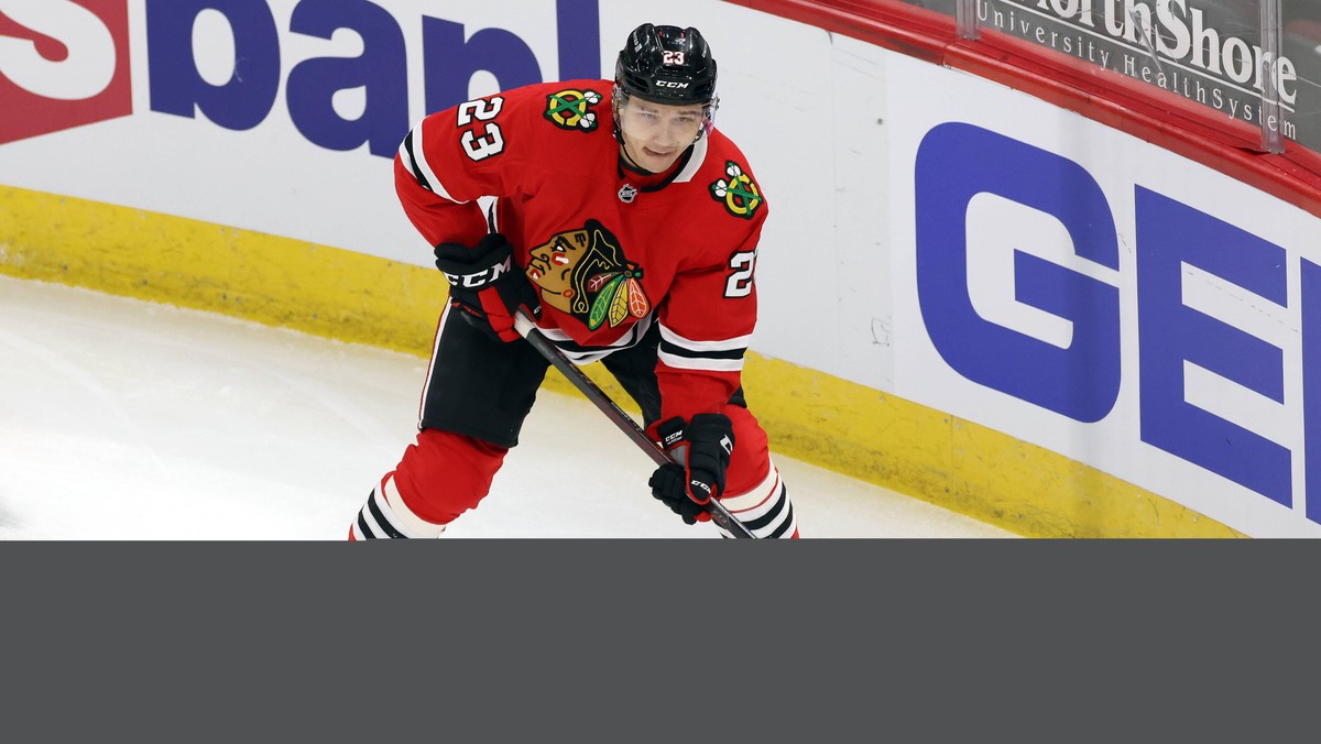 CHICAGO, IL - MARCH 07: Chicago Blackhawks left wing Philipp Kurashev (23) skates with the puck in action during a game between the Chicago Blackhawks and the Tampa Bay Lightning at the United Center  ...