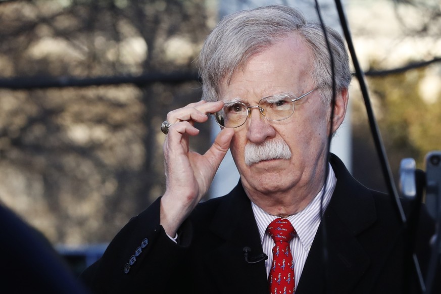 FILE - In this March 5, 2019 file photo, national security adviser John Bolton adjusts his glasses before an interview at the White House in Washington. (AP Photo/Jacquelyn Martin)
John Bolton