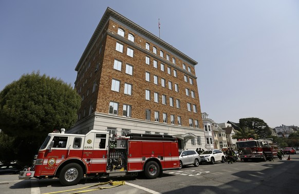 Fire trucks surround the Consulate-General of Russia after black smoke was seen coming from the roof Friday, Sept. 1, 2017, in San Francisco. The U.S. on Thursday ordered Russia to shut its San Franci ...