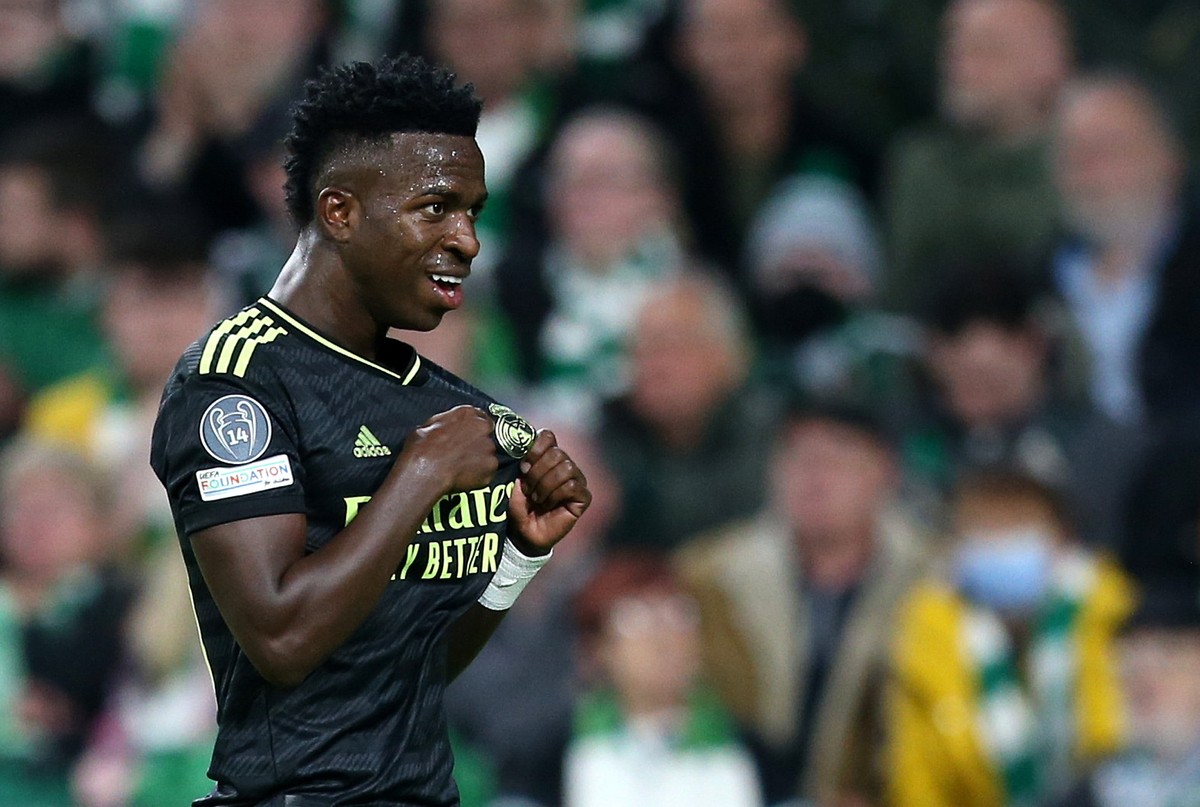 epa10165444 Vinicius Junior of Real Madrid celebrates after scoring the opening goal against goalkeeper Joe Hart of Celtic during the UEFA Champions League group F match between Celtic Glasgow and Rea ...