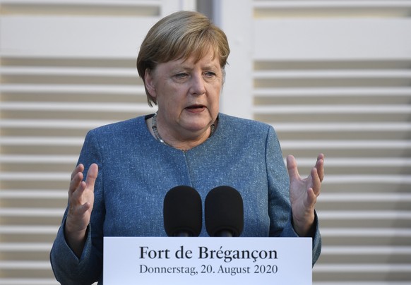 epa08614969 German Chancellor Angela Merkel speaks during a press conference after a meeting with French president Emmanuel Macron (not pictured) at Fort de Bregancon, in Bormes-les-Mimosas, south-eas ...