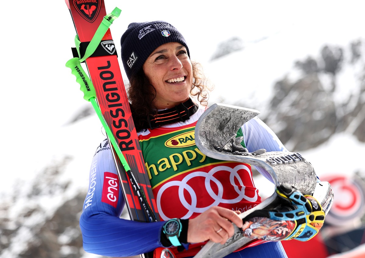 epa11684780 Winner Federica Brignone of Italy celebrates during the podium ceremony for the Women's Giant Slalom race at the FIS Alpine Skiing World Cup season opener on the Rettenbach glacier, i ...