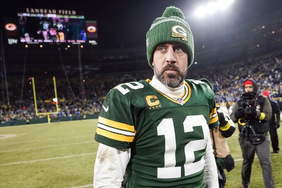 FILE - Green Bay Packers&#039; Aaron Rodgers walks off the field after an NFL football game against the Detroit Lions, Sunday, Jan. 8, 2023, in Green Bay, Wis. Rodgers says he will make a decision on ...