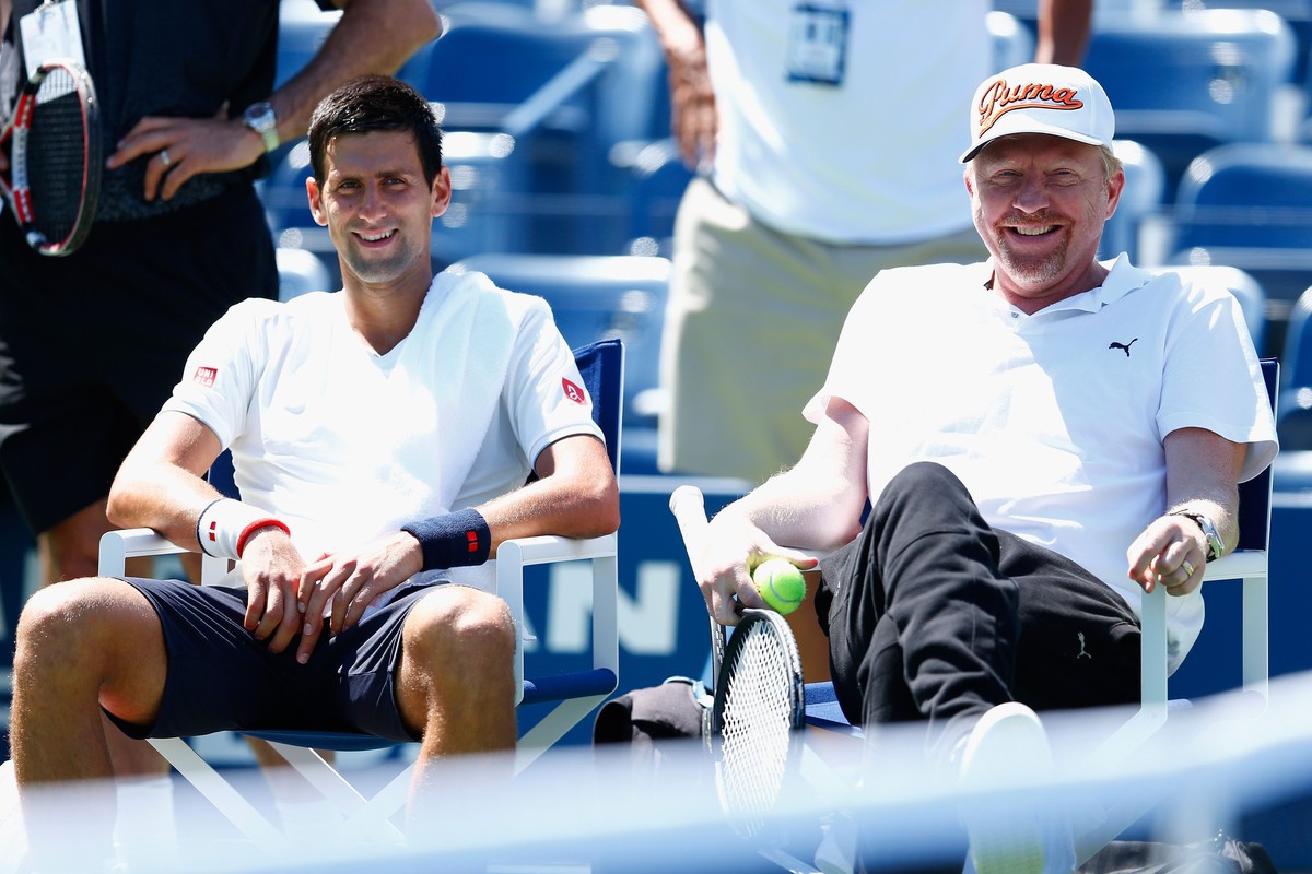 NEW YORK, NY - AUGUST 24: Novak Djokovic of Serbia talks with coach Boris Becker during previews for the US Open tennis at USTA Billie Jean King National Tennis Center on August 24, 2014 in New York C ...