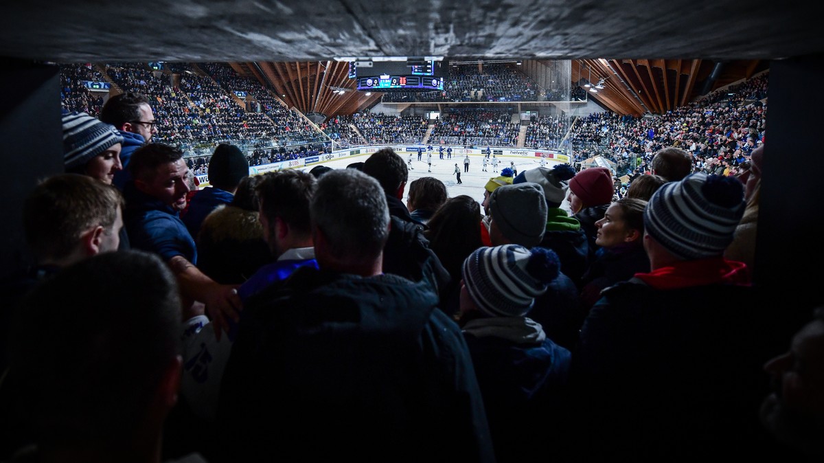 General view with fans during the game between Switzerland's HC Ambri-Piotta, and Swedens Oerebro HK, at the 94th Spengler Cup ice hockey tournament in Davos, Switzerland, Monday, December 26, 20 ...