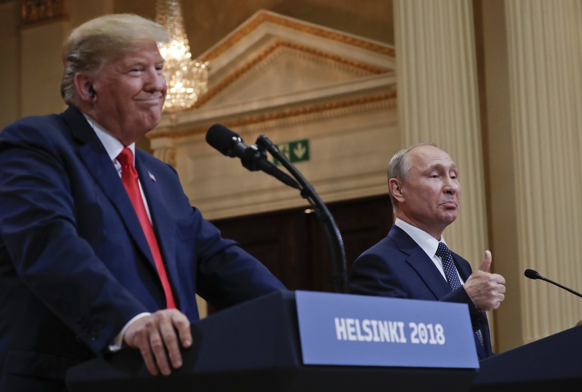 FILE - Russian President Vladimir Putin, right, and U.S. President Donald Trump give a joint news conference at the Presidential Palace in Helsinki, Finland, July 16, 2018. (AP Photo/Pablo Martinez Mo ...