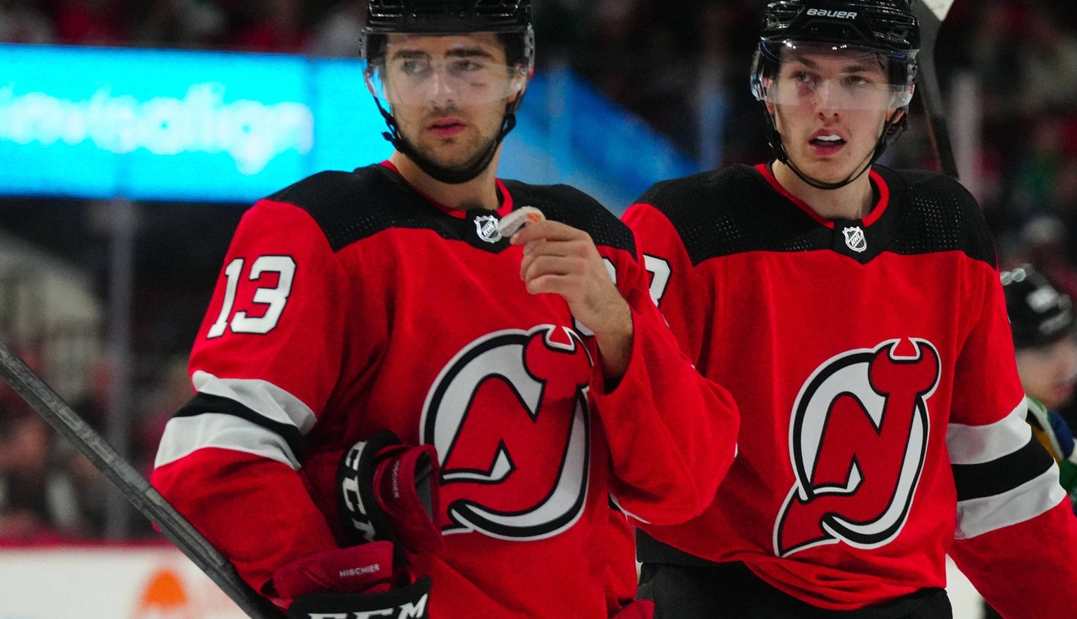 NHL, Eishockey Herren, USA New Jersey Devils at Carolina Hurricanes Feb 10, 2024 Raleigh, North Carolina, USA New Jersey Devils center Nico Hischier 13 and defenseman Luke Hughes 43 looks on against t ...