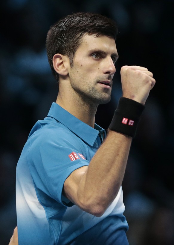 Tennis - Barclays ATP World Tour Finals - O2 Arena, London - 21/11/15
Men's Singles - Serbia's Novak Djokovic celebrates winning after his match against Spain's Rafael Nadal
Reuters / ...