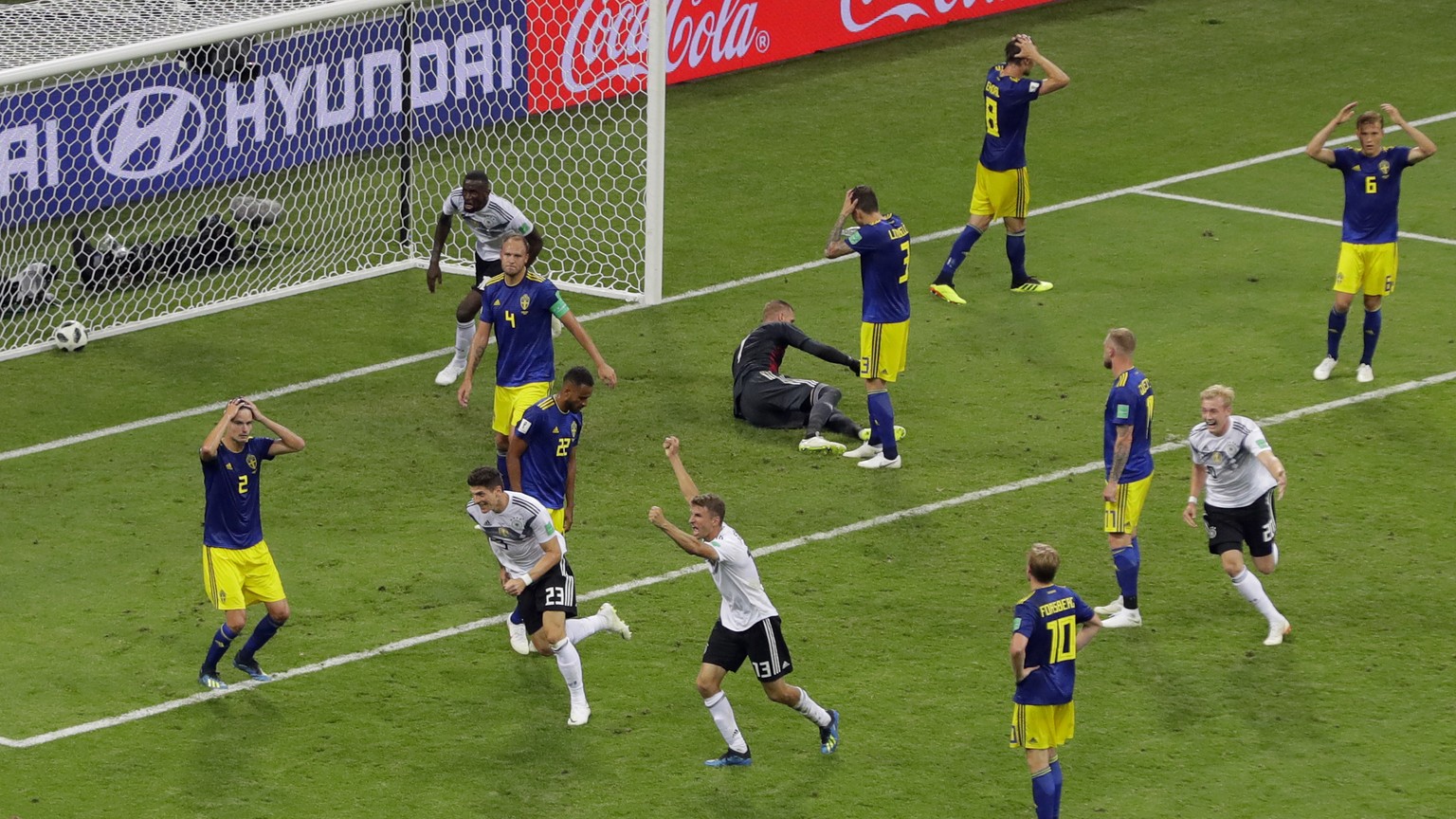 Germany players reacts after their teammate Toni Kroos, scoring his side&#039;s second goal during the group F match between Germany and Sweden at the 2018 soccer World Cup in the Fisht Stadium in Soc ...