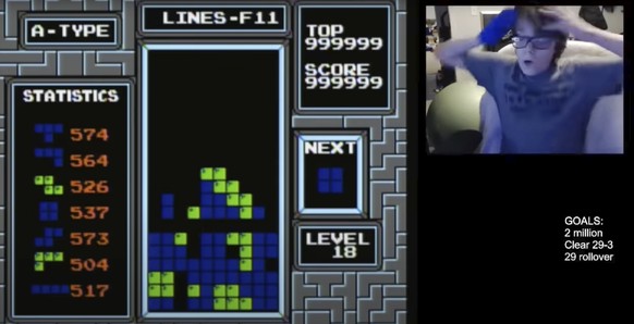 In this image taken from video, 13-year-old player named Willis Gibson reacts after playing a game of Tetris. Gibson, who in late December became the first player to officially ?beat? the original Nin ...